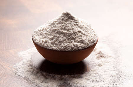 Buckwheat Flour on a Dark Wooden Butcher Blockの写真素材