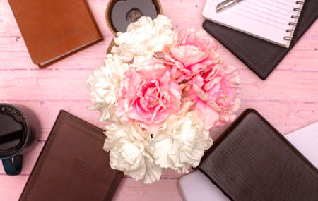 Group Bible Study with Hot Coffee on a Pink Wooden Tableの写真素材