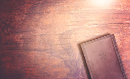 Personal Bible Study on a Distressed Red Wood Tableの写真素材