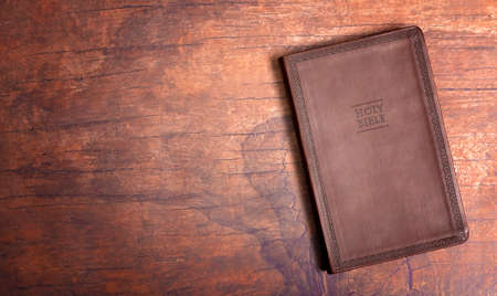 Personal Bible Study on a Distressed Red Wood Tableの写真素材