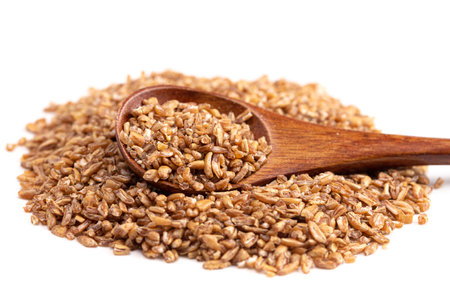 Pile of Bulgur Wheat Isolated on a White Backgroundの写真素材