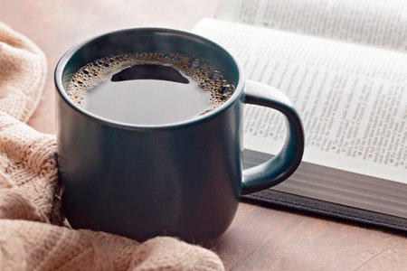 A Cup of Hot Coffee and a Bible for Cold Winter Morning