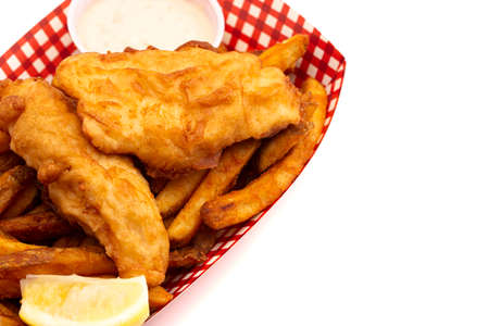 A Meal of Fish and Chips Isolated on a White Backgroundの写真素材