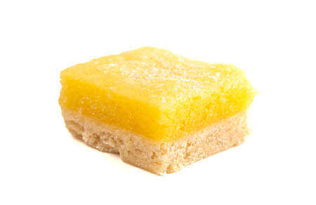 A Single Lemon Bar Square Isolated on a White Backgroundの写真素材