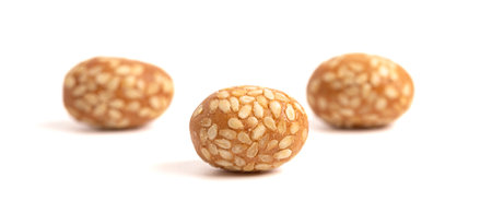 Crunchy Sesame Peanuts with Soy Sauce Isolatd on a White Backgroundの写真素材