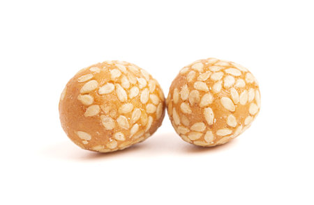 Crunchy Sesame Peanuts with Soy Sauce Isolatd on a White Backgroundの写真素材