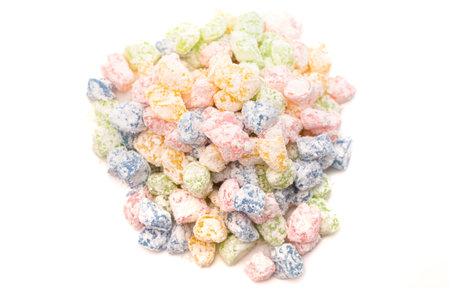 Rainbow Mini Mochi Rice Cake Candies Isolated on a White Backgroundの写真素材