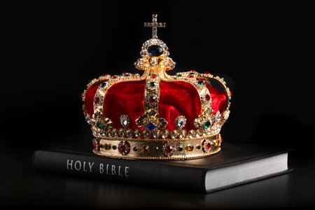 A Gold Coronation Crown with Red Velevet on a Bibleの写真素材