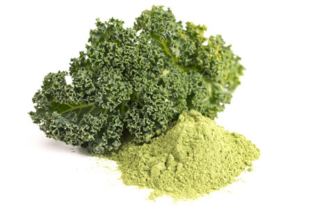 Pile of Green Kale Powder Isolated on a White Backgroundの写真素材