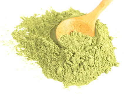 Pile of Green Kale Powder Isolated on a White Backgroundの写真素材