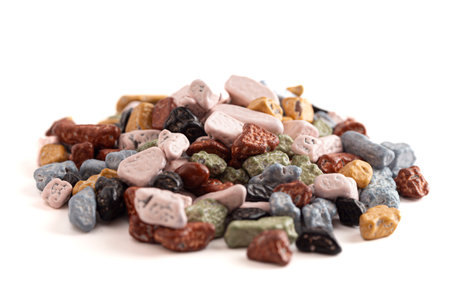 Pile of Chocolate Candy Rocks Isolated on a White Backgroundの写真素材
