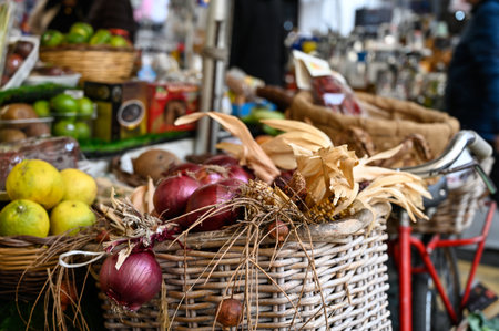 Onions in basket at a Roman market stall.の写真素材