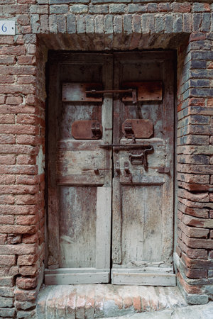 House entrance no. 6 of a very old house.の写真素材