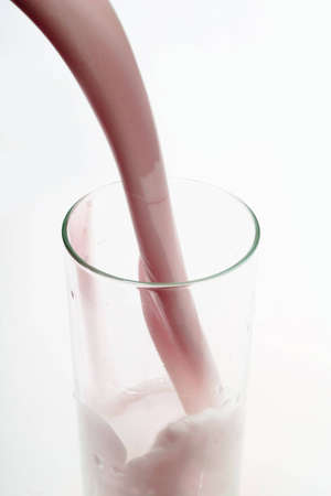 Pouring a cocoa in a glass