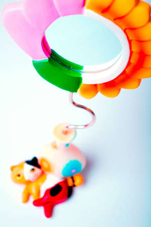 Decorative flower-mirror with a cat lying nearの写真素材