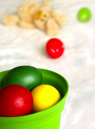 Easter Eggs with bunny at background (Shallow DOF)の写真素材