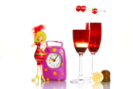 Time to party concept-clock, cocktails, candiesの写真素材