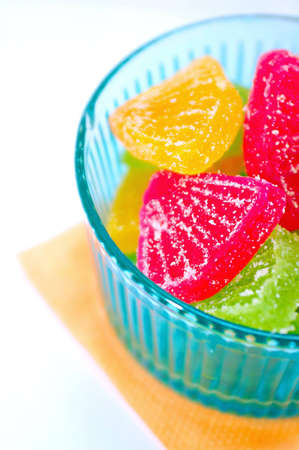 Colourful Fruit jellies in the blue vase (Shallow DOF)の写真素材