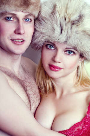 Man and Woman pair in fur hatsの写真素材