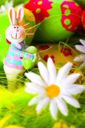 Easter bunny and colorful painted eggs