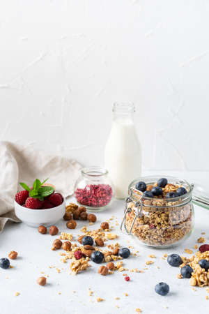 Healthy breakfast set on grey background. The concept of delicious and healthy food. Top view, copy space.の写真素材