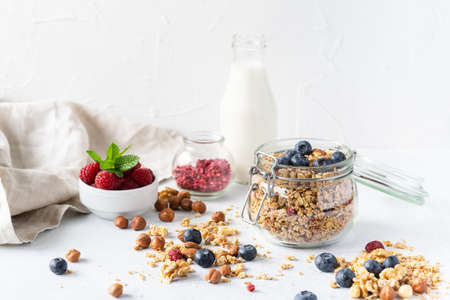 Healthy breakfast set on grey background. The concept of delicious and healthy food. Top view, copy space.の写真素材