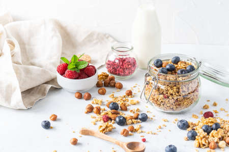 Healthy breakfast set on grey background. The concept of delicious and healthy food. Top view, copy space.の写真素材
