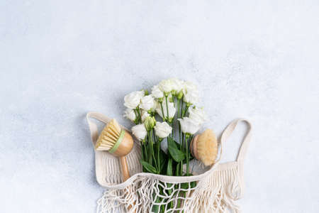 Eco-friendly kitchen accessories on a background. The concept zero waste and our planet.