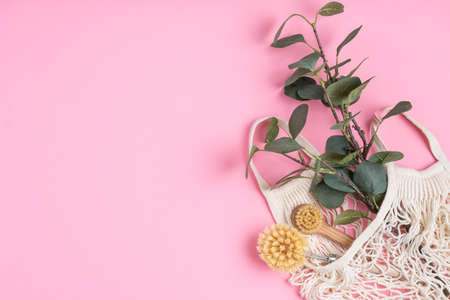 Eco-friendly kitchen accessories on pink background. The concept zero waste and our planet.の写真素材