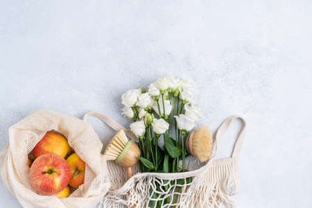 Eco-friendly kitchen accessories on a color background. The concept zero waste and our planet.の写真素材