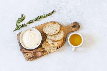 Fried toast made of fresh bread with sauce and olive oil. Alternative handmade food cooking concept. Top view, copy spaceの写真素材