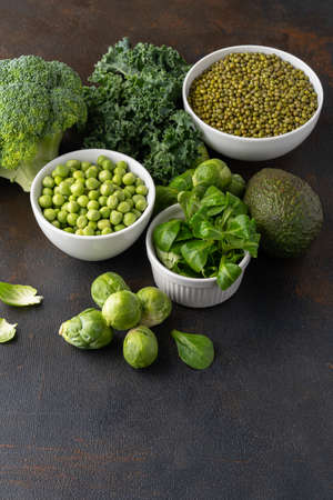 Healthy vegetarian food concept background, fresh green food selection for detox. Healthy lifestyle, green vegetables. Top viewの写真素材