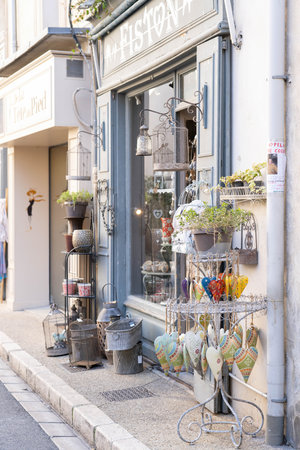 Charming floral boutique display on quaint european streetの写真素材