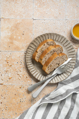 Tile background with breakfast cake and orange juice.の写真素材