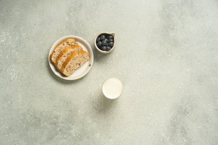 Top view of toast with milk on light grey background.の写真素材