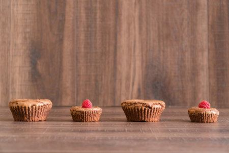 Chocolate lava cakes with fresh raspberriesの写真素材