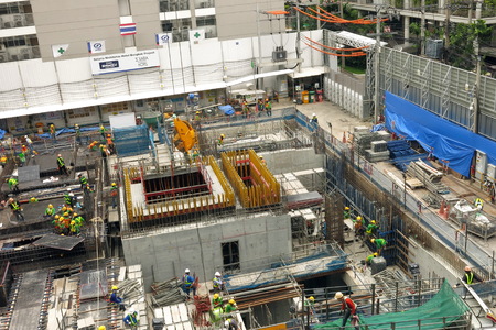 Bangkok,Thailand - July 2018 : workers working in the hotel construction site near BTS sky train stationのeditorial素材