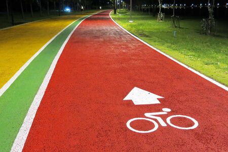 the bike lane in the park at nightの写真素材