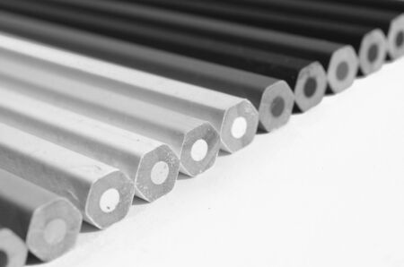 Pencil crayons in black and white.
