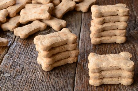 A top view image of several bone shaped dog treats.の写真素材