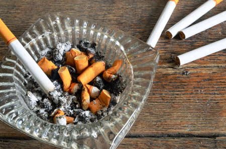 Cigarettes and Ashtray Backgroundの写真素材