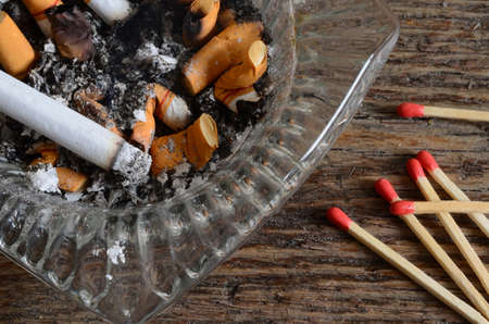 Cigarettes and Ashtray Backgroundの写真素材
