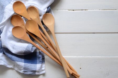 Wooden Mixing Spoons and Dish Towelの写真素材
