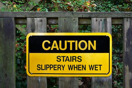 Bright Yellow Caution Signの写真素材