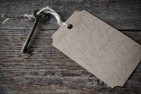 Old Door Key and Paper Label