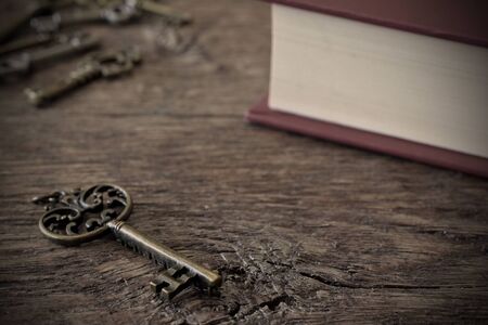 Antique Door Key and Old Red Bookの写真素材