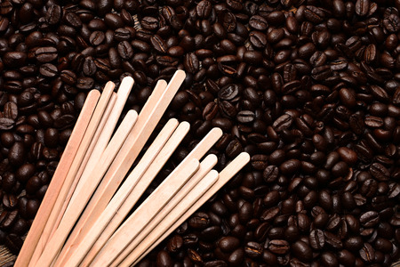 Coffee Beans and Wooden Stir Sticksの写真素材