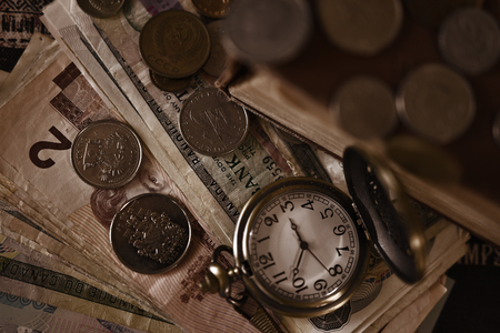 Old Pocket Watch and Money