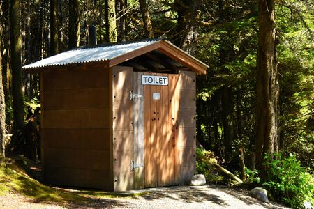 Outdoor Public Toilet in Wooded Area