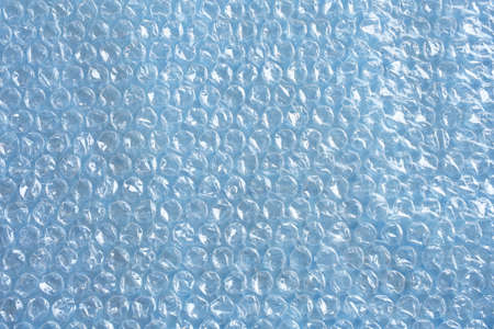 An abstract image of clear plastic wrap used in packaging.